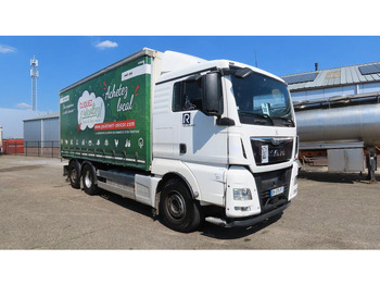 Φορτηγό μουσαμάς MAN TGX 18.480