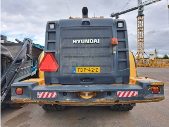 Ελαστιχοφόρος φορτωτής Hyundai HL980XT: φωτογραφία 4