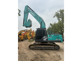 Ερπυστριοφόρος εκσκαφέας KOBELCO SK210LC: φωτογραφία 2 Ερπυστριοφόρος εκσκαφέας KOBELCO SK210LC: φωτογραφία 2
