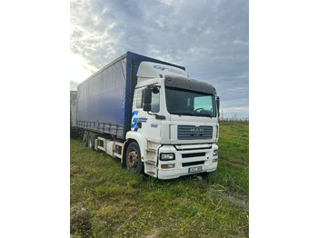 Φορτηγό μουσαμάς MAN TGA 26.310