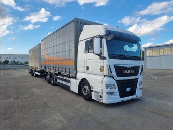Φορτηγό μουσαμάς MAN TGX 26.440