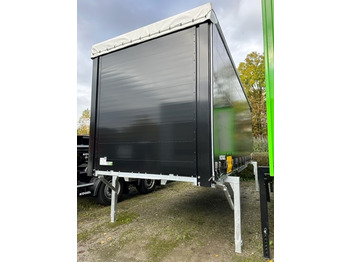 Αμάξωμα με συρρόμενο μουσαμά KÖGEL