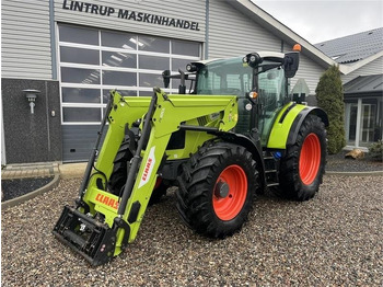 Τρακτέρ Claas Arion 440 CIS med frontlæsser: φωτογραφία 2