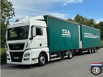 Φορτηγό μουσαμάς MAN TGX 18.440