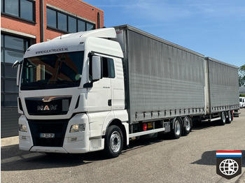 Φορτηγό μουσαμάς MAN TGX 26.480
