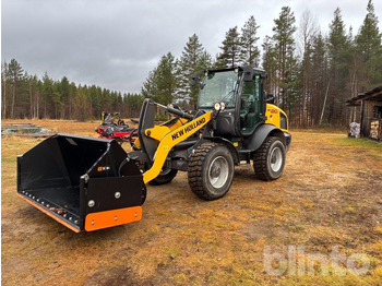 Ελαστιχοφόρος φορτωτής NEW HOLLAND