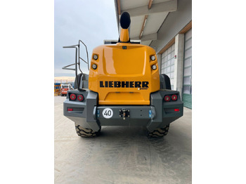 Ελαστιχοφόρος φορτωτής LIEBHERR L 566