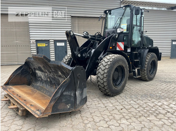 Ελαστιχοφόρος φορτωτής CATERPILLAR 910