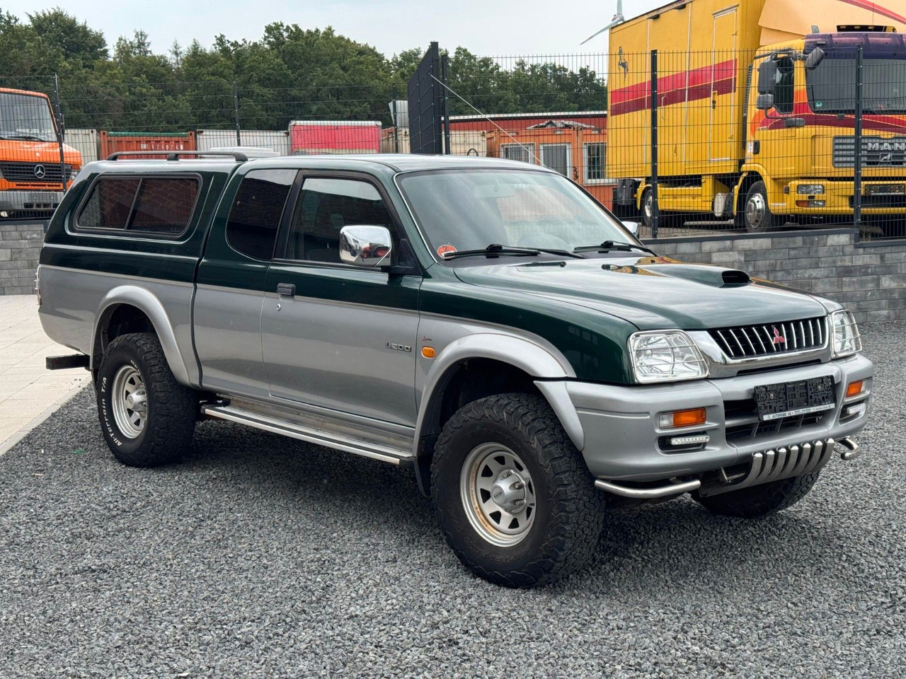 Mitsubishi L200 Klima - SUV: φωτογραφία 3 Mitsubishi L200 Klima - SUV: φωτογραφία 3