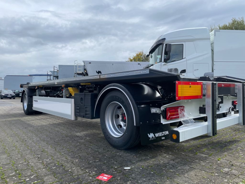 Wielton 2-Achs Außenroller-Abrollanhänger Wielton 2-Achs Außenroller-Abrollanhänger - Ρυμούλκα γάντζος/ Αλυσιδάκι: φωτογραφία 3 Wielton 2-Achs Außenroller-Abrollanhänger Wielton 2-Achs Außenroller-Abrollanhänger - Ρυμούλκα γάντζος/ Αλυσιδάκι: φωτογραφία 3