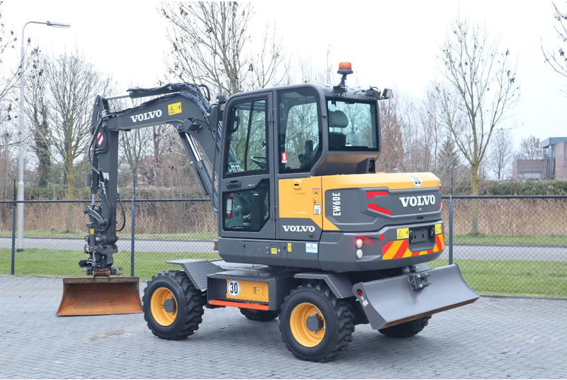 Volvo EW 60 E | DEMO | 30 KM/H | ROTOTILT + GRIPPER | BUCKET - Τροχοφόρος εκσκαφέας: φωτογραφία 3 Volvo EW 60 E | DEMO | 30 KM/H | ROTOTILT + GRIPPER | BUCKET - Τροχοφόρος εκσκαφέας: φωτογραφία 3