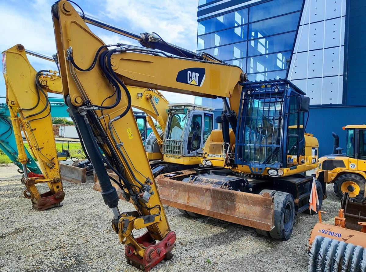 Caterpillar M318D MH - Τροχοφόρος εκσκαφέας: φωτογραφία 2 Caterpillar M318D MH - Τροχοφόρος εκσκαφέας: φωτογραφία 2