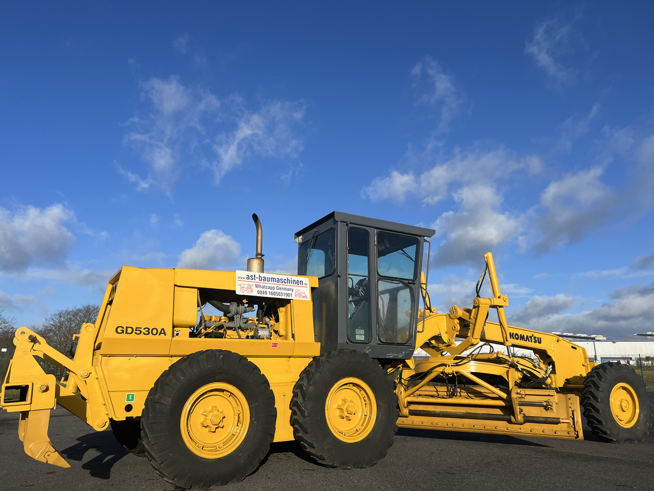 KOMATSU GD530A mit 5-Zahn-Heckaufreisser - Γκρέιντερ: φωτογραφία 5 KOMATSU GD530A mit 5-Zahn-Heckaufreisser - Γκρέιντερ: φωτογραφία 5