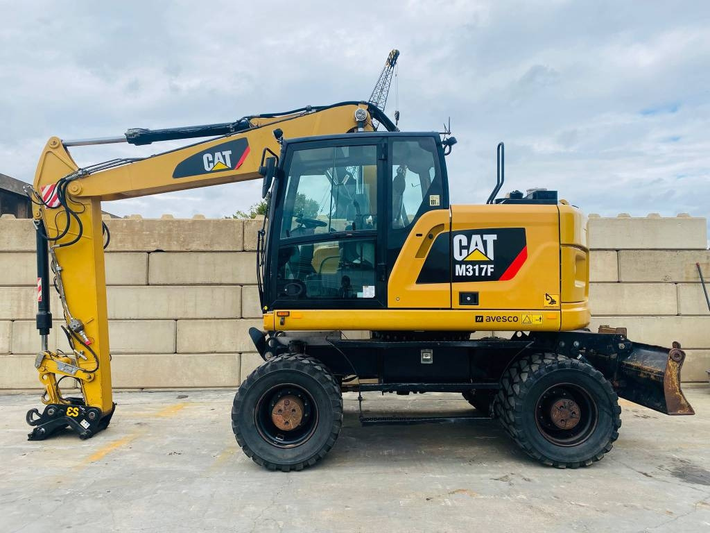 CAT m317f - Τροχοφόρος εκσκαφέας: φωτογραφία 1 CAT m317f - Τροχοφόρος εκσκαφέας: φωτογραφία 1