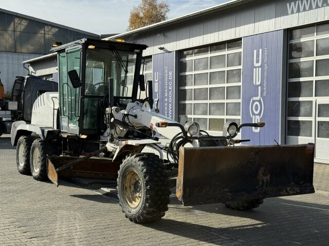 New Holland F106.6A alrrad 6x6 Grader 12 Ton - 10.700 Std - Γκρέιντερ: φωτογραφία 1 New Holland F106.6A alrrad 6x6 Grader 12 Ton - 10.700 Std - Γκρέιντερ: φωτογραφία 1