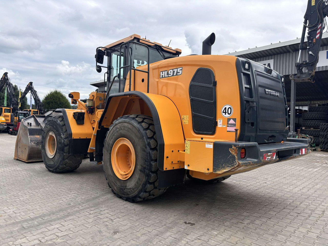 Hyundai HL975 - Ελαστιχοφόρος φορτωτής: φωτογραφία 4 Hyundai HL975 - Ελαστιχοφόρος φορτωτής: φωτογραφία 4