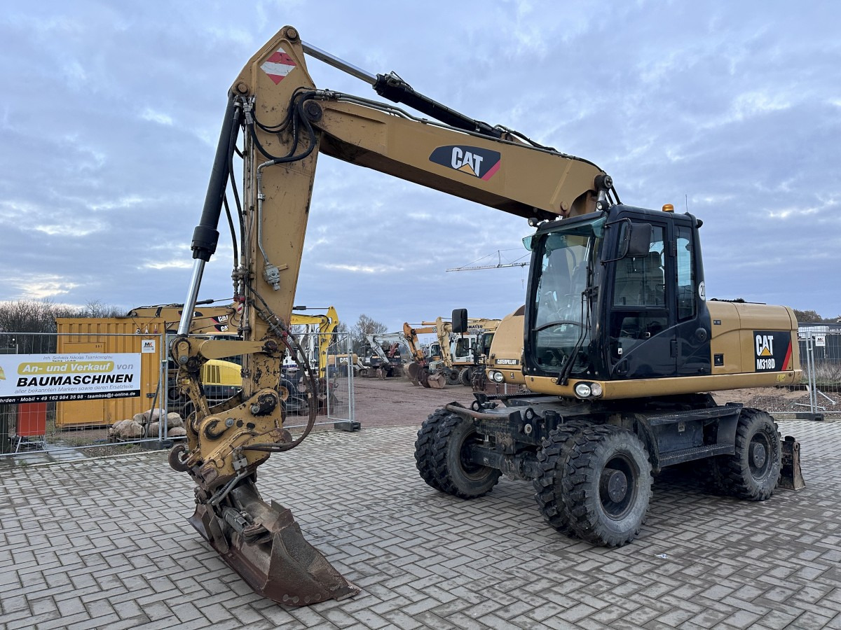 CATERPILLAR M 318 D full Hydr. Top Zustand German machine ! - Τροχοφόρος εκσκαφέας: φωτογραφία 4 CATERPILLAR M 318 D full Hydr. Top Zustand German machine ! - Τροχοφόρος εκσκαφέας: φωτογραφία 4