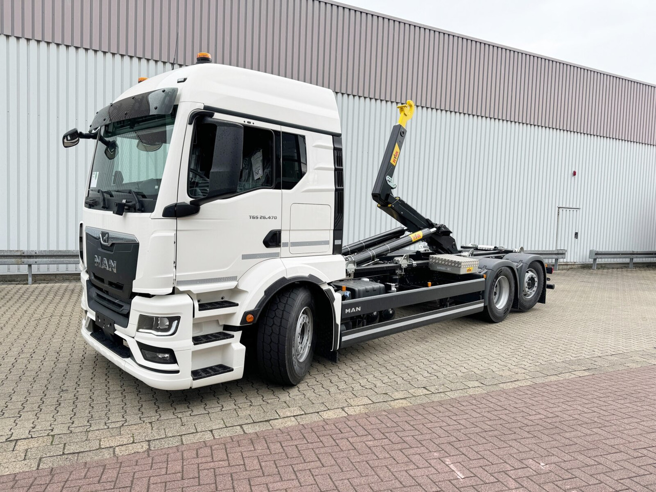 MAN TGS 26.470 6x2-4 LL CH TGS 26.470 6x2-4 LL CH, Retarder, Navi, Lenk-/Liftachse - Φορτηγό φόρτωσης γάντζου: φωτογραφία 1 MAN TGS 26.470 6x2-4 LL CH TGS 26.470 6x2-4 LL CH, Retarder, Navi, Lenk-/Liftachse - Φορτηγό φόρτωσης γάντζου: φωτογραφία 1