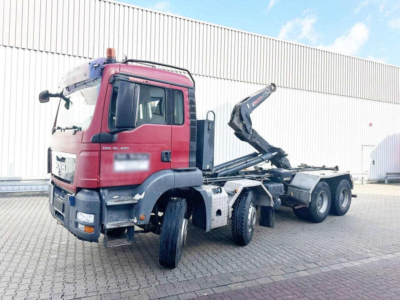 MAN TGS 35.480 8X4 BL TGS 35.400 8x4 BL, Schub-Knick bis 6,5m Container - Φορτηγό φόρτωσης γάντζου: φωτογραφία 1 MAN TGS 35.480 8X4 BL TGS 35.400 8x4 BL, Schub-Knick bis 6,5m Container - Φορτηγό φόρτωσης γάντζου: φωτογραφία 1