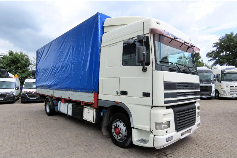 DAF XF 95.430 Manual diesel injection! Manual gearbox! - Φορτηγό μουσαμάς: φωτογραφία 1 DAF XF 95.430 Manual diesel injection! Manual gearbox! - Φορτηγό μουσαμάς: φωτογραφία 1