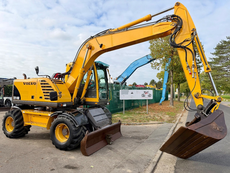 Volvo EW 140 B *FULL HYDR* - BLADE - 10.485h - TILT BUCKET - CE - NL MACHINE - GOOD CONDITION - Τροχοφόρος εκσκαφέας: φωτογραφία 1 Volvo EW 140 B *FULL HYDR* - BLADE - 10.485h - TILT BUCKET - CE - NL MACHINE - GOOD CONDITION - Τροχοφόρος εκσκαφέας: φωτογραφία 1