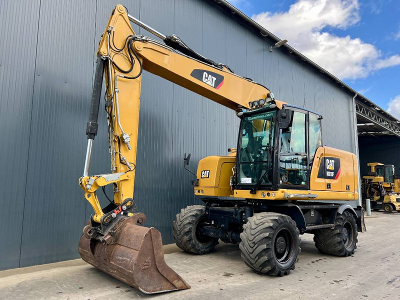 Cat M318F - Τροχοφόρος εκσκαφέας: φωτογραφία 1 Cat M318F - Τροχοφόρος εκσκαφέας: φωτογραφία 1