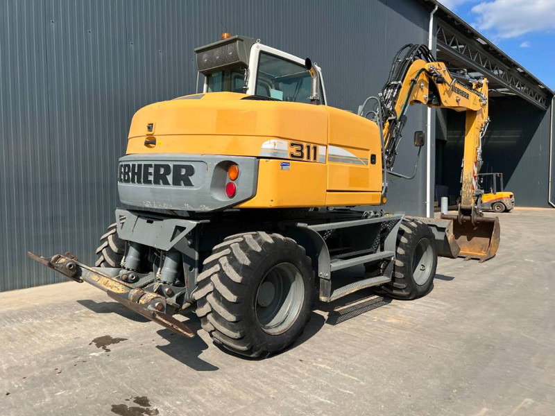 Liebherr A311 Litronic - Τροχοφόρος εκσκαφέας: φωτογραφία 4 Liebherr A311 Litronic - Τροχοφόρος εκσκαφέας: φωτογραφία 4