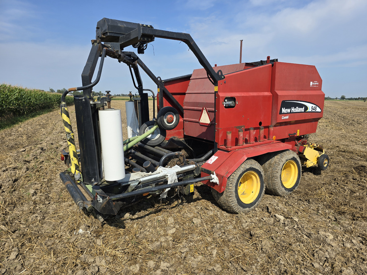 NEW HOLLAND 548 Combi - Χορτοδετική μηχανή στρόγγυλης μπάλας: φωτογραφία 3 NEW HOLLAND 548 Combi - Χορτοδετική μηχανή στρόγγυλης μπάλας: φωτογραφία 3