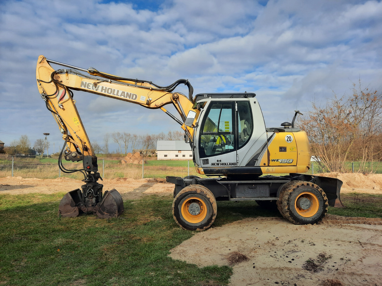 NEW HOLLAND WE150C - Τροχοφόρος εκσκαφέας: φωτογραφία 2 NEW HOLLAND WE150C - Τροχοφόρος εκσκαφέας: φωτογραφία 2