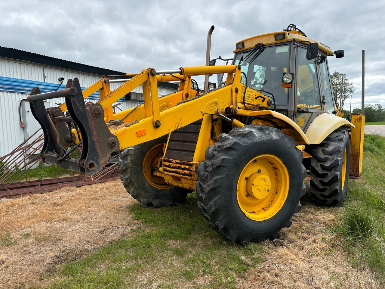 JCB 4CX - Φορτωτής εκσκαφέας: φωτογραφία 1 JCB 4CX - Φορτωτής εκσκαφέας: φωτογραφία 1