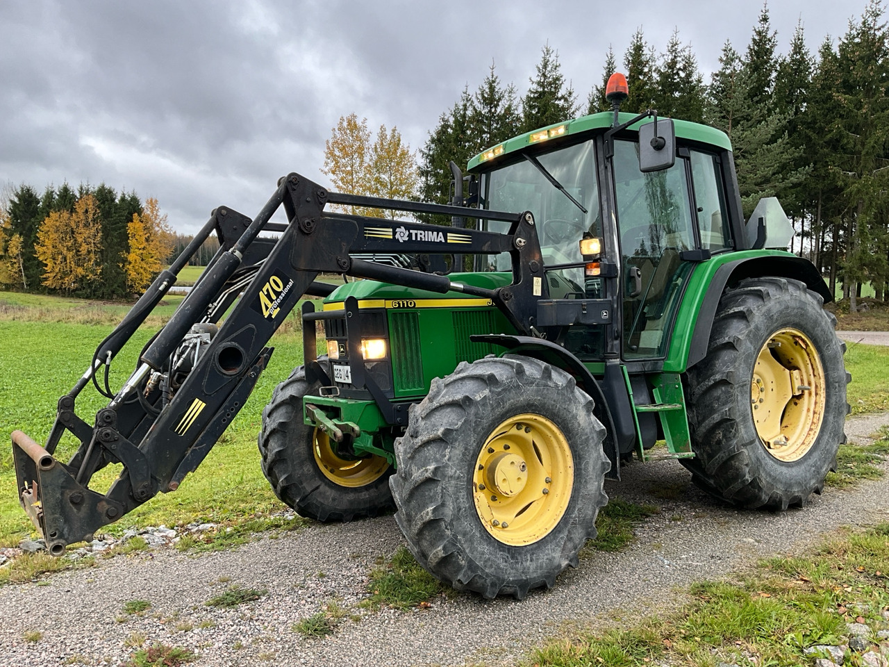 John Deere 6110 - Τρακτέρ: φωτογραφία 1 John Deere 6110 - Τρακτέρ: φωτογραφία 1