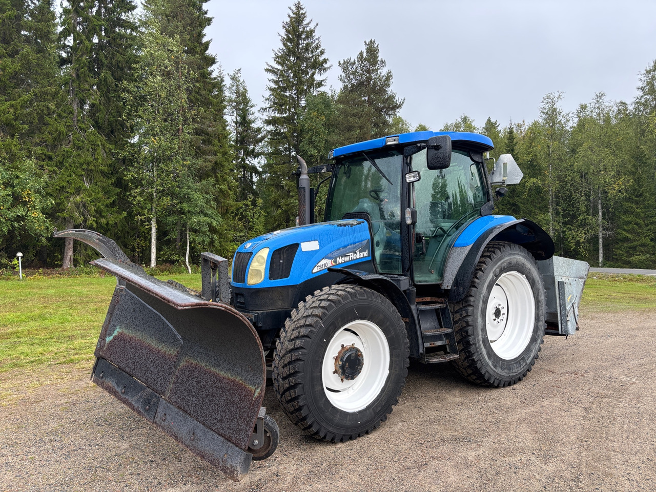 New Holland TS110A - Τρακτέρ: φωτογραφία 1 New Holland TS110A - Τρακτέρ: φωτογραφία 1
