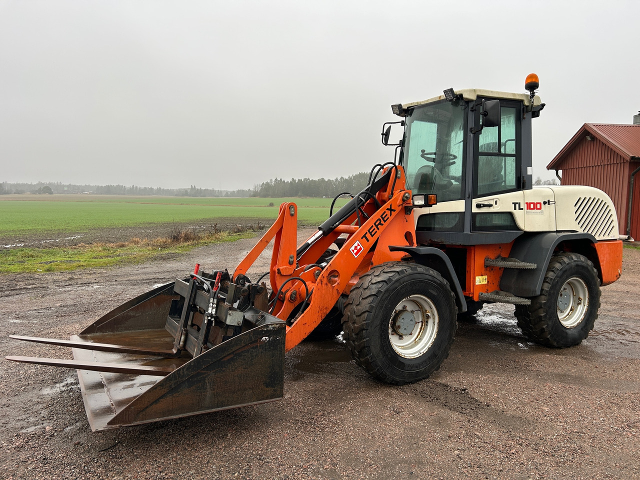 Terex TL100 - Ελαστιχοφόρος φορτωτής: φωτογραφία 1 Terex TL100 - Ελαστιχοφόρος φορτωτής: φωτογραφία 1