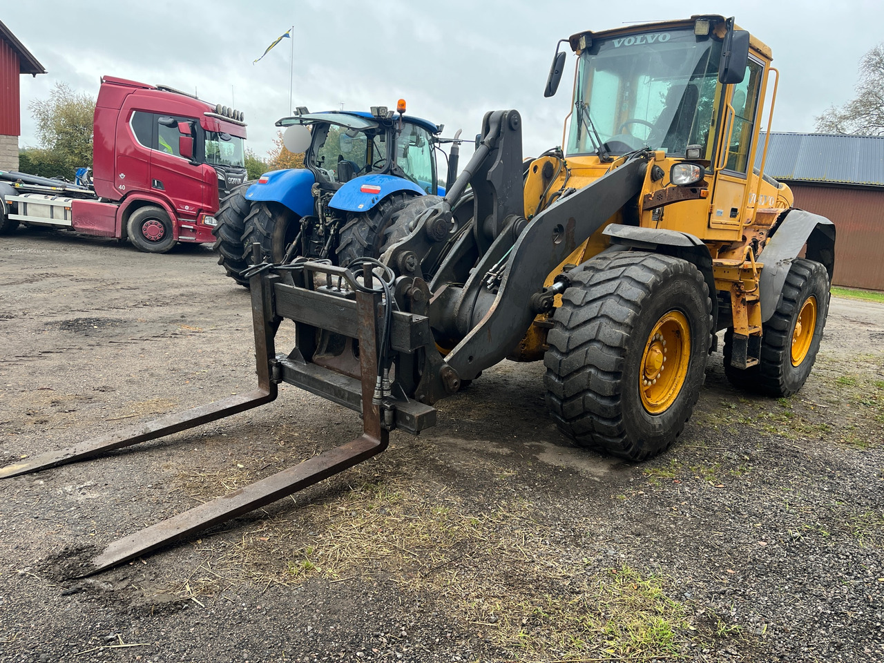 Volvo L70E - Ελαστιχοφόρος φορτωτής: φωτογραφία 1 Volvo L70E - Ελαστιχοφόρος φορτωτής: φωτογραφία 1