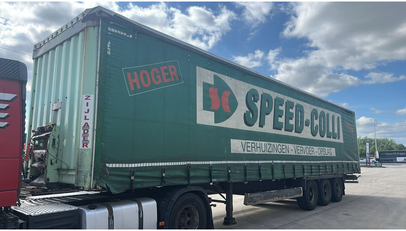 Krone SDP27 (BPW AXLES / DISC BRAKES / BELGIAN TRAILER / GOOD TYRES) - Επικαθήμενο κουρτίνα: φωτογραφία 1 Krone SDP27 (BPW AXLES / DISC BRAKES / BELGIAN TRAILER / GOOD TYRES) - Επικαθήμενο κουρτίνα: φωτογραφία 1