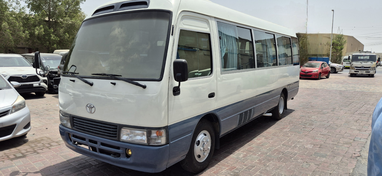 Toyota Coaster ... 30 places - climatisé - Μικρό λεωφορείο, Επιβατικό βαν: φωτογραφία 1 Toyota Coaster ... 30 places - climatisé - Μικρό λεωφορείο, Επιβατικό βαν: φωτογραφία 1