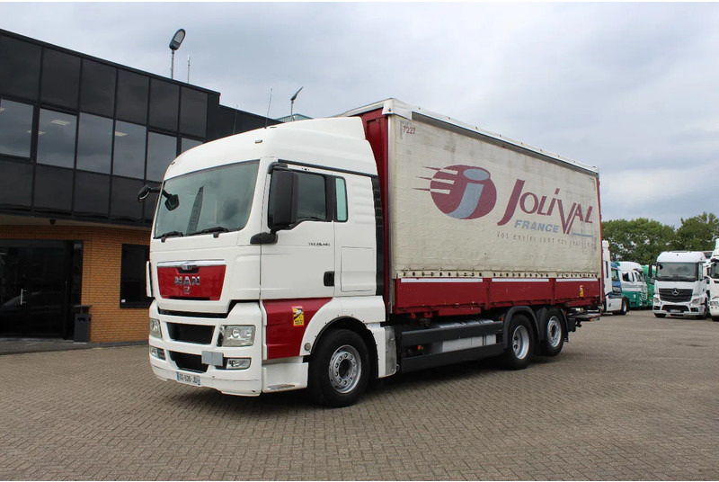 MAN TGX 26.440 * EURO5 * 6X2 * LIFT AXLE * - Φορτηγό μουσαμάς: φωτογραφία 1 MAN TGX 26.440 * EURO5 * 6X2 * LIFT AXLE * - Φορτηγό μουσαμάς: φωτογραφία 1
