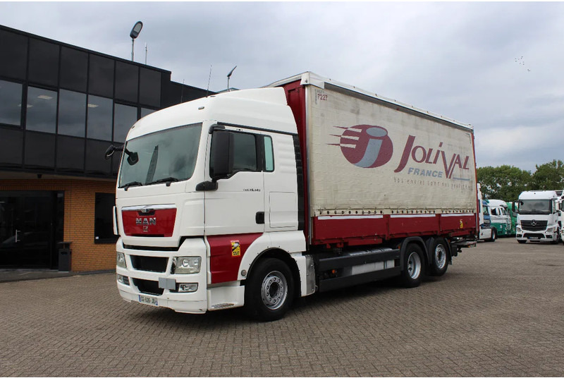 MAN TGX 26.440 * EURO5 * 6X2 * LIFT AXLE * - Φορτηγό μουσαμάς: φωτογραφία 2 MAN TGX 26.440 * EURO5 * 6X2 * LIFT AXLE * - Φορτηγό μουσαμάς: φωτογραφία 2