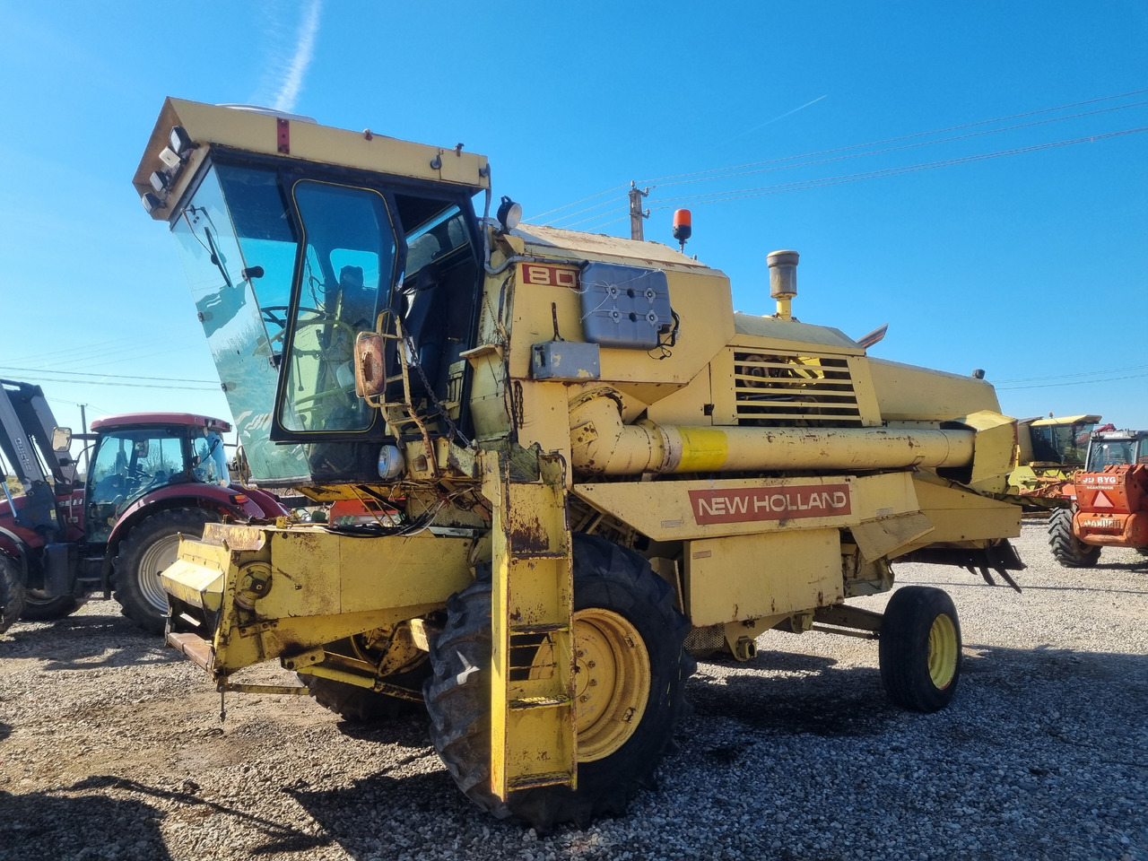 New Holland 8080 - Θεριζοαλωνιστική μηχανή: φωτογραφία 1 New Holland 8080 - Θεριζοαλωνιστική μηχανή: φωτογραφία 1