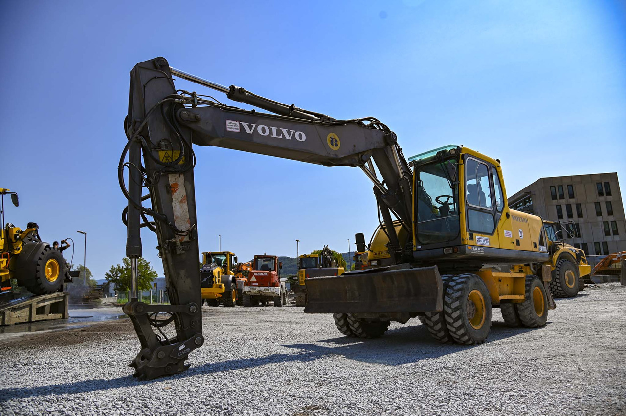 VOLVO EW180B - Τροχοφόρος εκσκαφέας: φωτογραφία 1 VOLVO EW180B - Τροχοφόρος εκσκαφέας: φωτογραφία 1