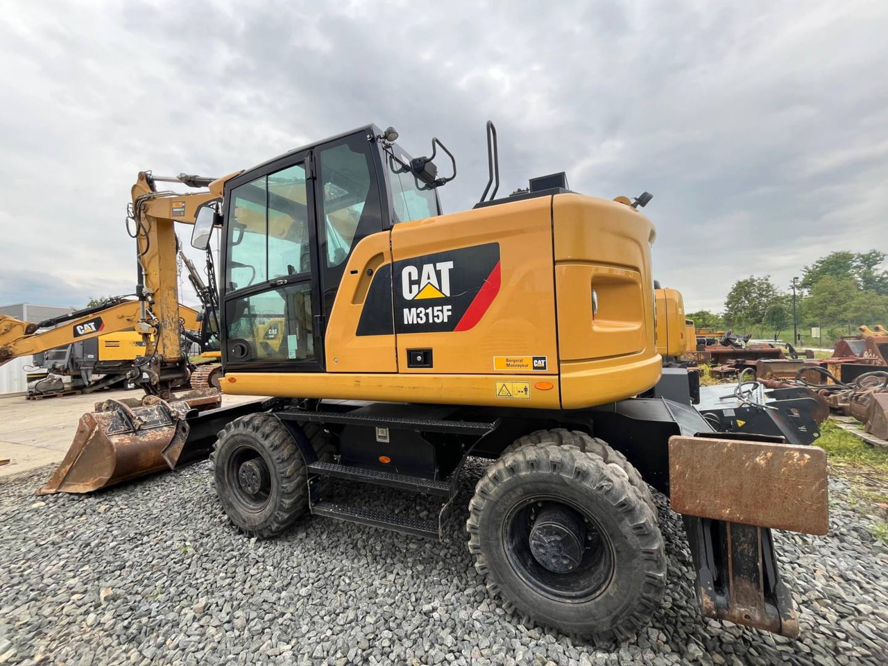 CAT M315F - Τροχοφόρος εκσκαφέας: φωτογραφία 4 CAT M315F - Τροχοφόρος εκσκαφέας: φωτογραφία 4