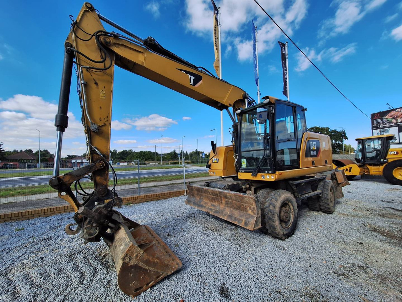 CAT M318F - Τροχοφόρος εκσκαφέας: φωτογραφία 1 CAT M318F - Τροχοφόρος εκσκαφέας: φωτογραφία 1