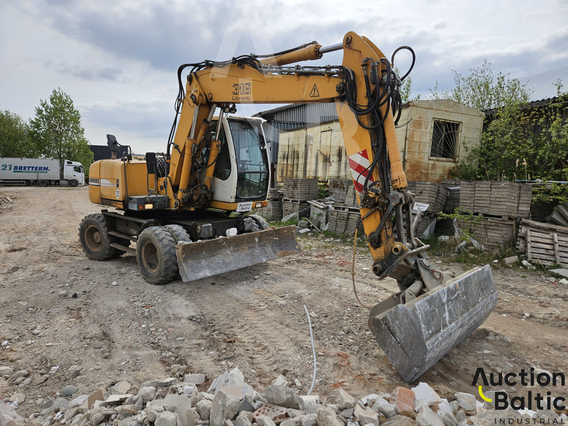 Liebherr A 316 Litronic - Τροχοφόρος εκσκαφέας: φωτογραφία 2 Liebherr A 316 Litronic - Τροχοφόρος εκσκαφέας: φωτογραφία 2