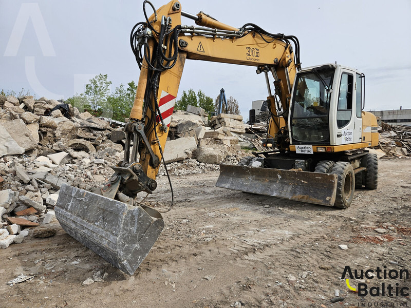 Liebherr A 316 Litronic - Τροχοφόρος εκσκαφέας: φωτογραφία 1 Liebherr A 316 Litronic - Τροχοφόρος εκσκαφέας: φωτογραφία 1