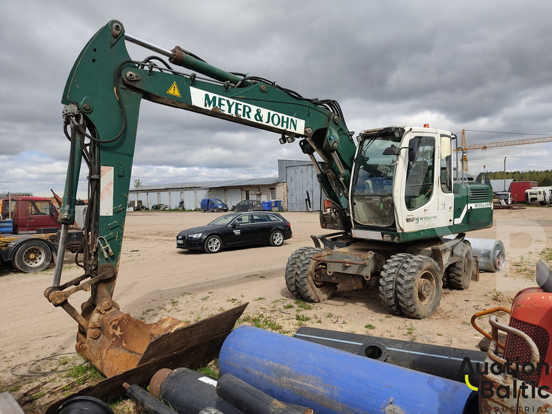 Liebherr A 900 C Litronic - Τροχοφόρος εκσκαφέας: φωτογραφία 1 Liebherr A 900 C Litronic - Τροχοφόρος εκσκαφέας: φωτογραφία 1