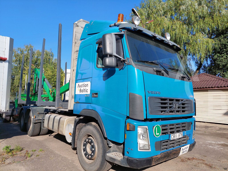 Volvo FH12 - Φορτηγό ξυλείας: φωτογραφία 1 Volvo FH12 - Φορτηγό ξυλείας: φωτογραφία 1