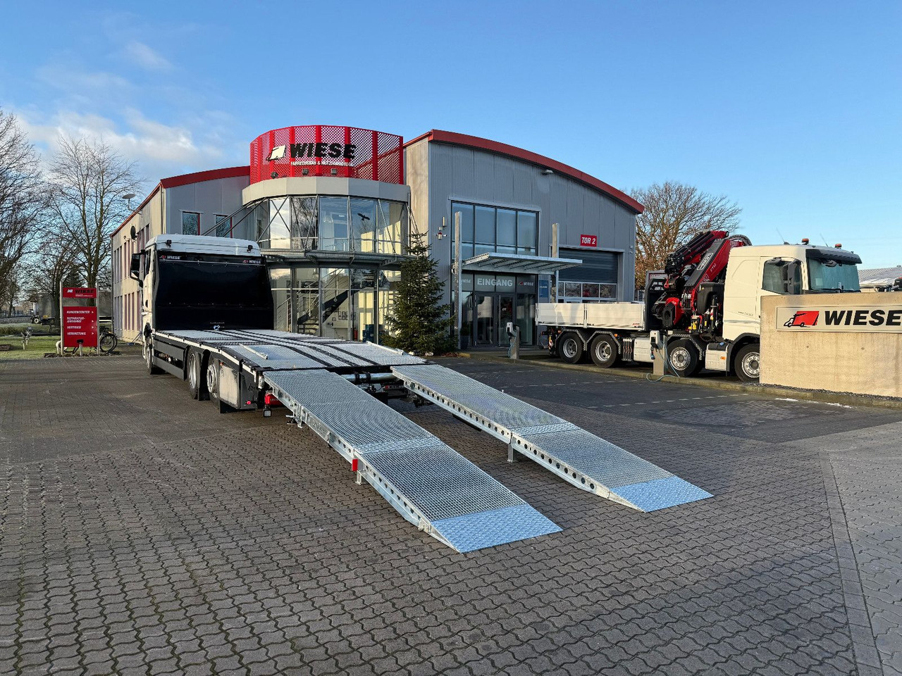 MAN Baumaschinen-  Arbeitsbühnentransporter Rampen - Φορτηγό αυτοκινητάμαξα: φωτογραφία 1 MAN Baumaschinen-  Arbeitsbühnentransporter Rampen - Φορτηγό αυτοκινητάμαξα: φωτογραφία 1