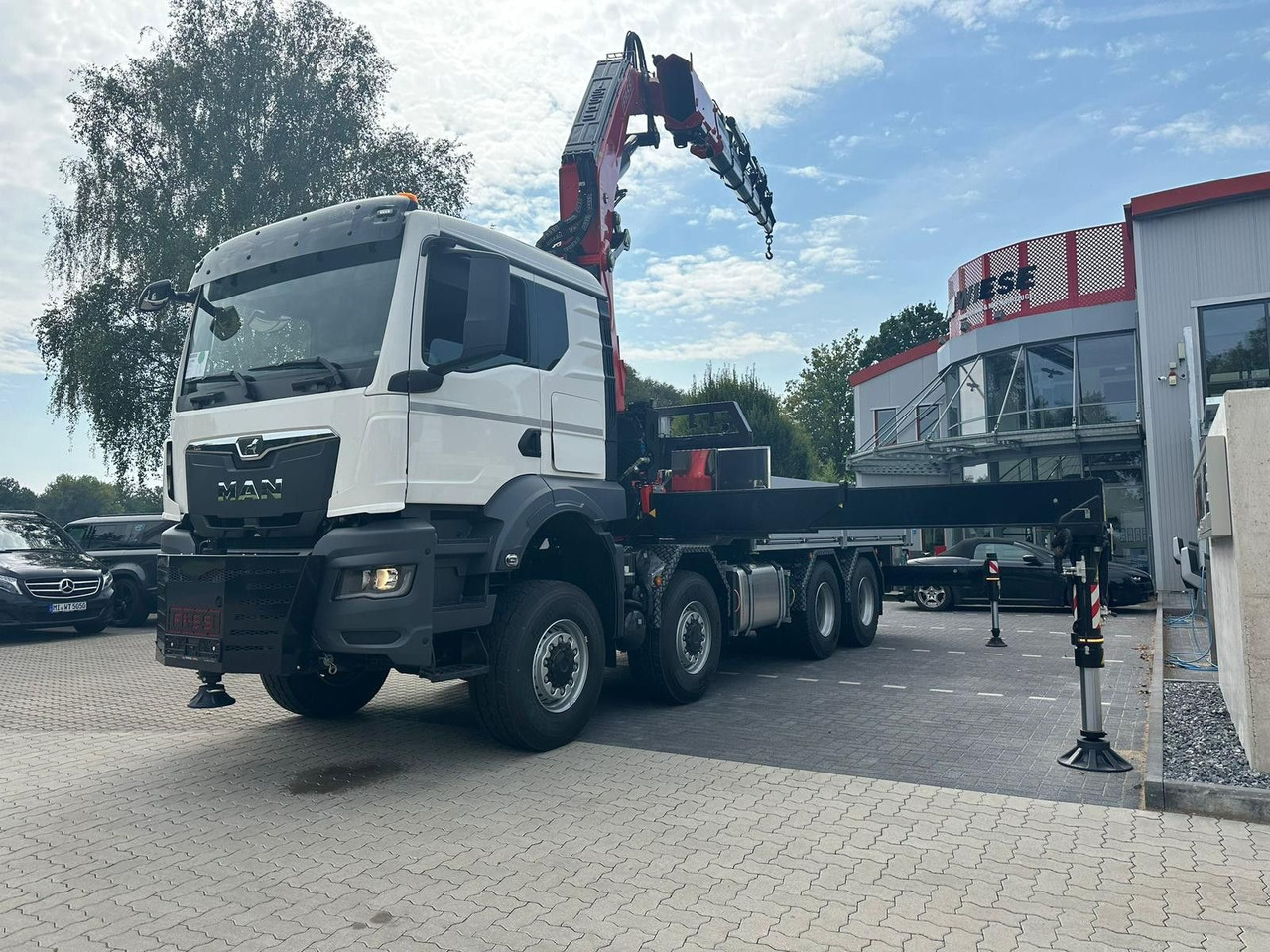 MAN TGS 41.520 8x8 mit Fassi Ladekran F710RA.2.26 - Φορτηγό με ανοιχτή καρότσα: φωτογραφία 2 MAN TGS 41.520 8x8 mit Fassi Ladekran F710RA.2.26 - Φορτηγό με ανοιχτή καρότσα: φωτογραφία 2