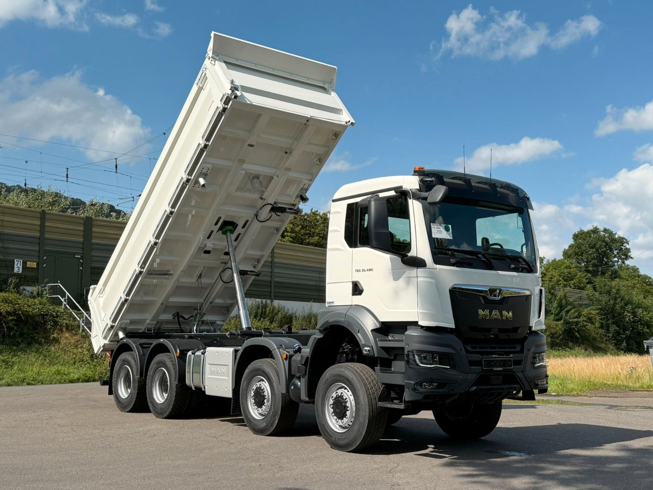 Φορτηγό ανατρεπόμενο MAN TGS 35.480 8x8 EuromixMTP 3-Seiten-Kipper: φωτογραφία 16