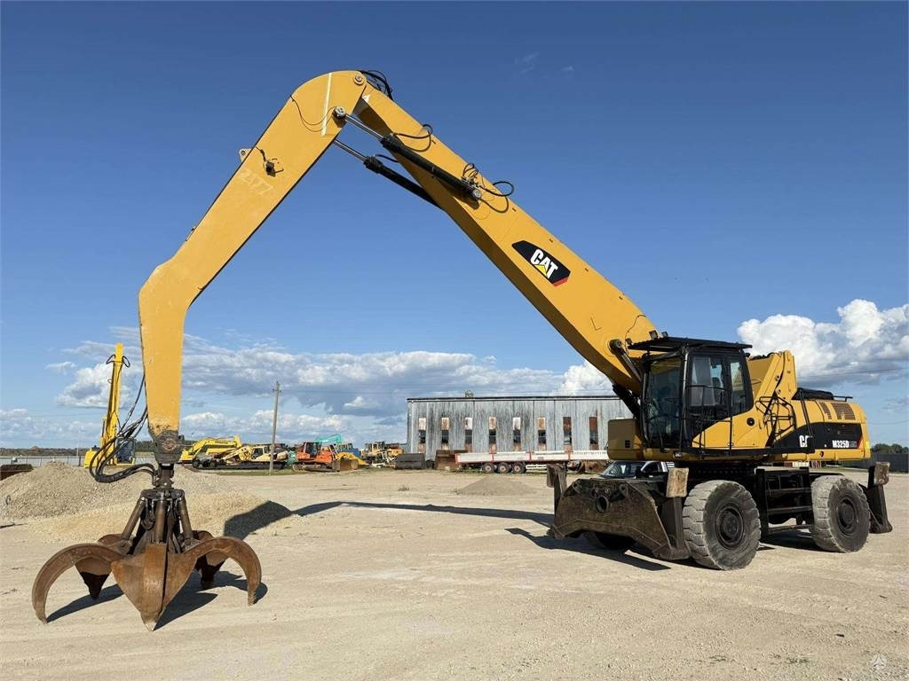 CAT M 325 DLMH - Τροχοφόρος εκσκαφέας: φωτογραφία 1 CAT M 325 DLMH - Τροχοφόρος εκσκαφέας: φωτογραφία 1